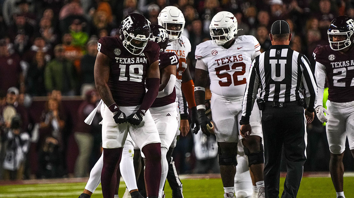 Texas A&M defensive lineman Cashius Howell (18) celebrates a defensive stop during the Lone Star Showdown against the Texas Longhorns at Kyle Field on Saturday, Nov. 30, 2024 in College Station, Texas.