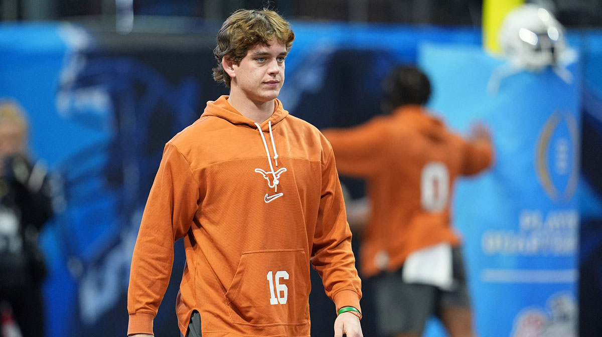 Texas Longhorns quarterback Arch Manning (16) warms up before the Peach Bowl at Mercedes-Benz Stadium.