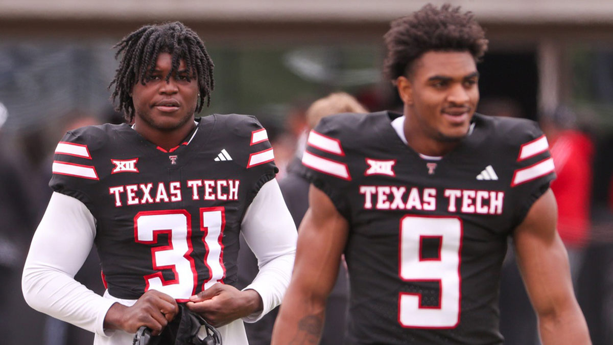 David Bailey (31) and Romello Height walk to the field before the Texas Tech football team's spring game, Saturday, April 19, 2025, at Jones AT&T Stadium.