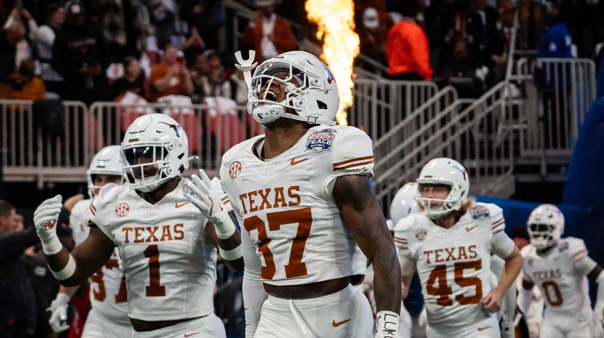 Texas Longhorns linebacker Morice Blackwell Jr. (37) runs out with his team as the Texas Longhorns prepare to play the Arizona State Sun Devils in the Peach Bowl College Football Playoff quarterfinal at Mercedes-Benz Stadium in Atlanta, Georgia, Jan. 1, 2025.
