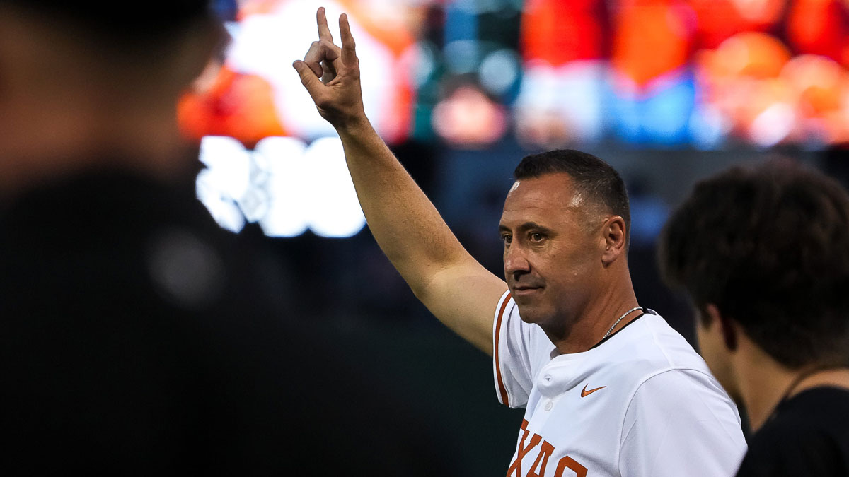Texas Longhorns head football coach Steve Sarkisian takes the field for the first pitch ahead of the Lone Star Showdown against Texas A&M at UFCU Disch-Falk Field.