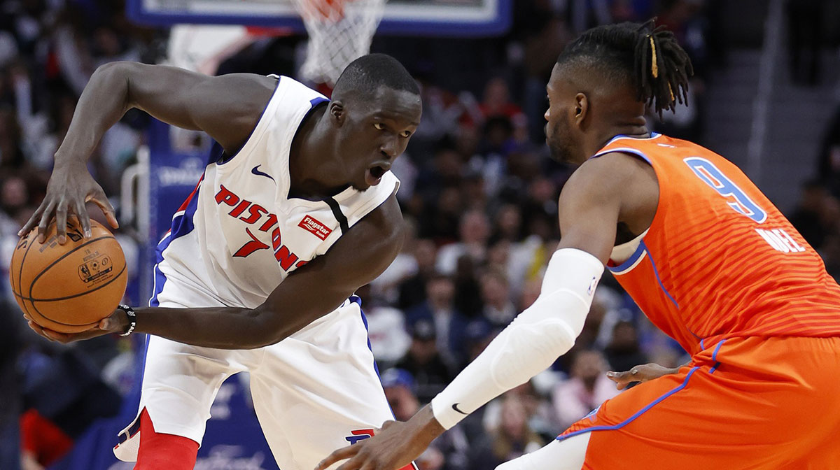 Detroit Pistons forward Thon Maker (7) controls the ball against Oklahoma City Thunder center Nerlens Noel (9) at Little Caesars Arena.