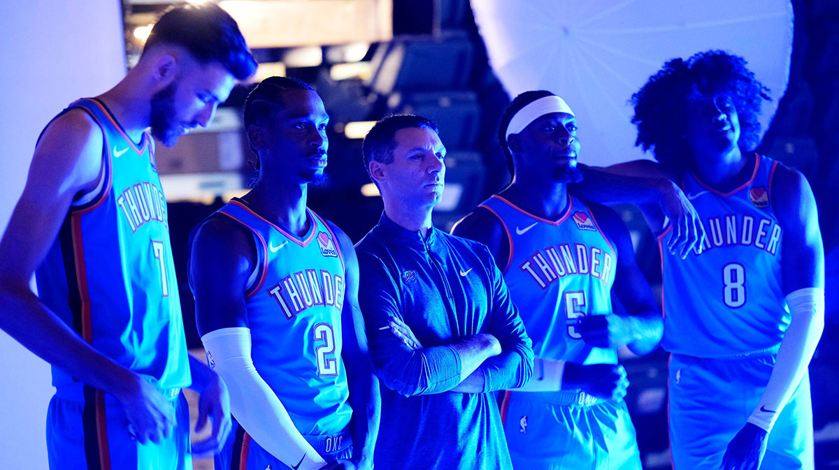 Thunder Chet Holmgren, Shai Gilgeous-Alexander, coach Mark Daigneault, Luguentz Dort and Jalen Williams pose for a photo during Thunder media day Monday, Sept. 30, 2024, at Paycom Center
