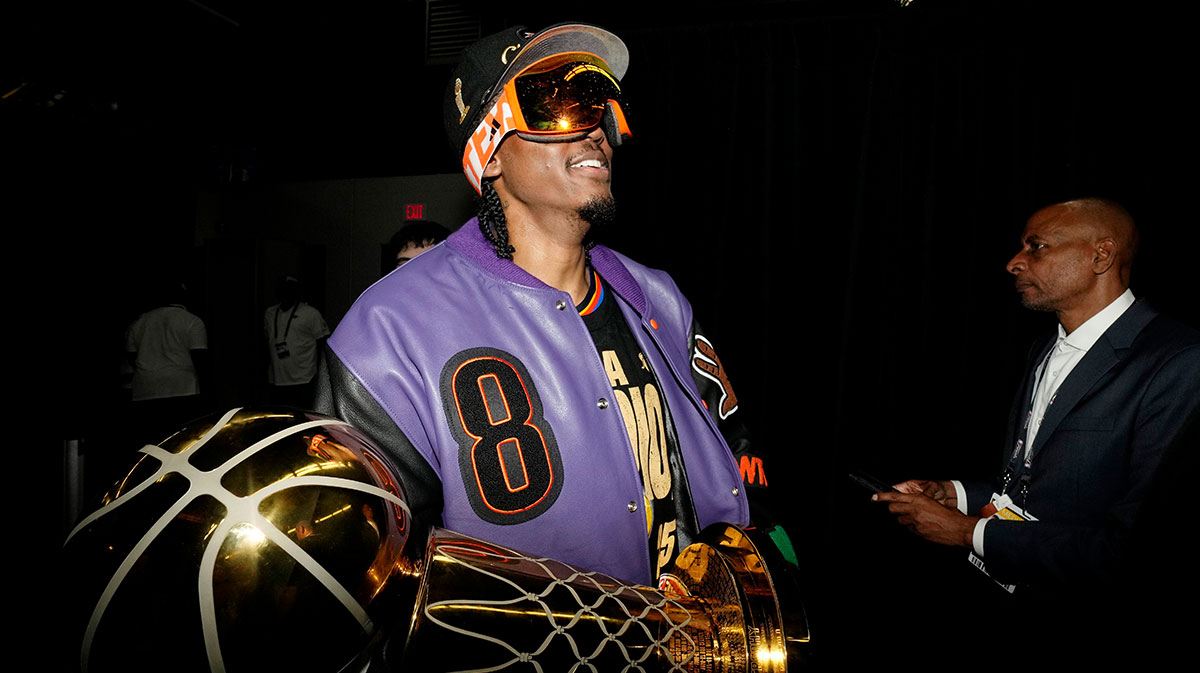 Thunder forward Jalen Williams (8) celebrates after winning game seven of the 2025 NBA Finals against the Indiana Pacers at Paycom Center with Kobe Bryant in the background