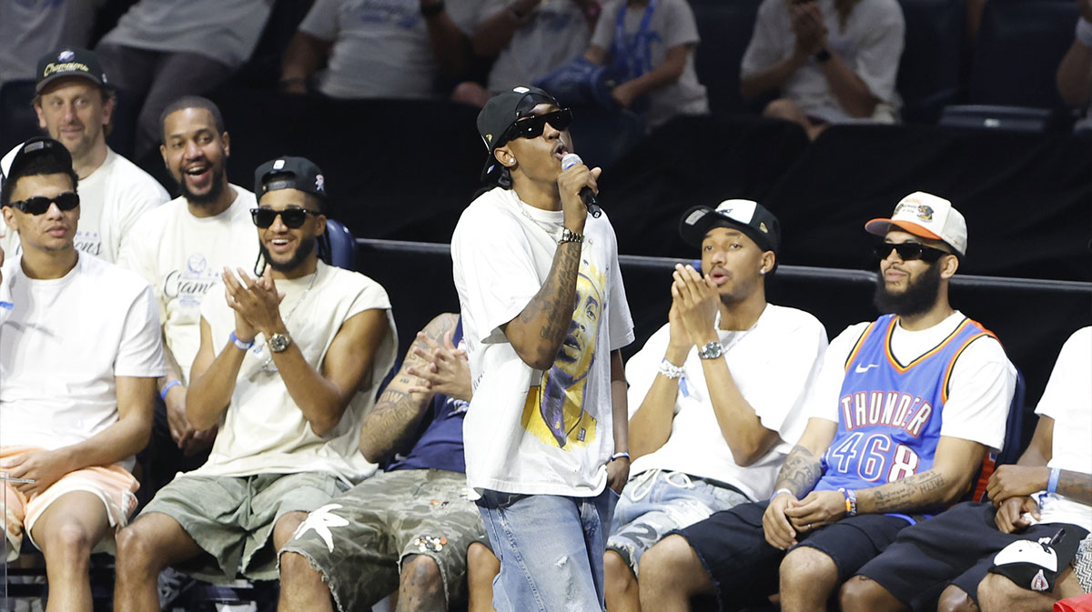 Thunder forward Jalen Williams (8) speaks to fans during the Champions Opening Ceremony for the parade inside the Paycom Center with Kobe Bryant on his t-shirt