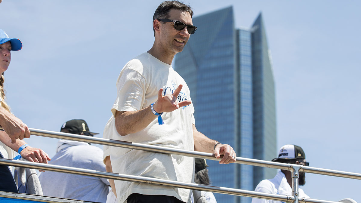Thunder head coach Mark Daigneault signals to the fans during the 2025 NBA Oklahoma City Thunder championship parade