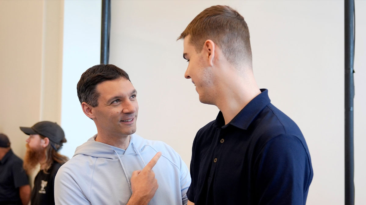 Thunder head coach Mark Daigneault talks with Thunder rookie Nikola Topic during an introductory press conference for the 2024 Thunder draft picks at Oklahoma Contemporary Arts Center in Oklahoma City