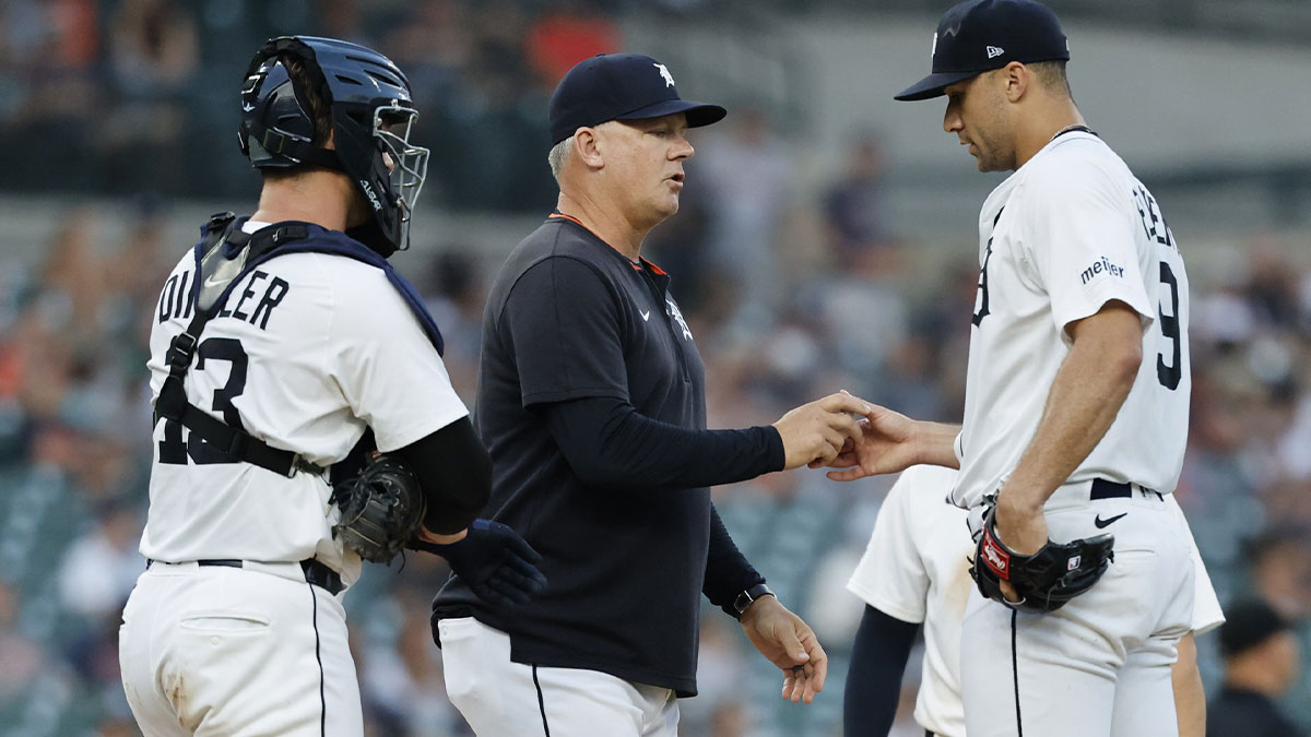 Detroit Tigers manager A.J. Hinch (14) take the ball to relieve pitcher Jack Flaherty (9) in the seventh inning against the Tampa Bay Rays at Comerica Park.