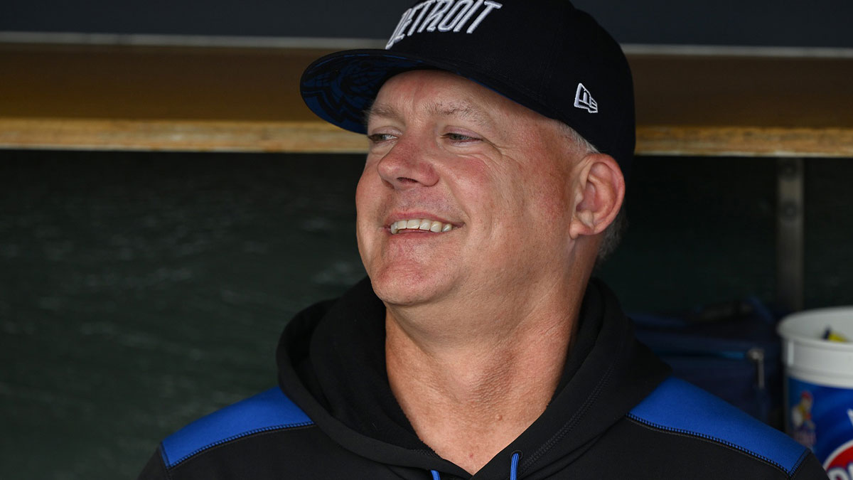 Detroit Tigers manager A.J. Hinch (14) jokes around with his players in the dugout before their game against the Seattle Mariners at Comerica Park.