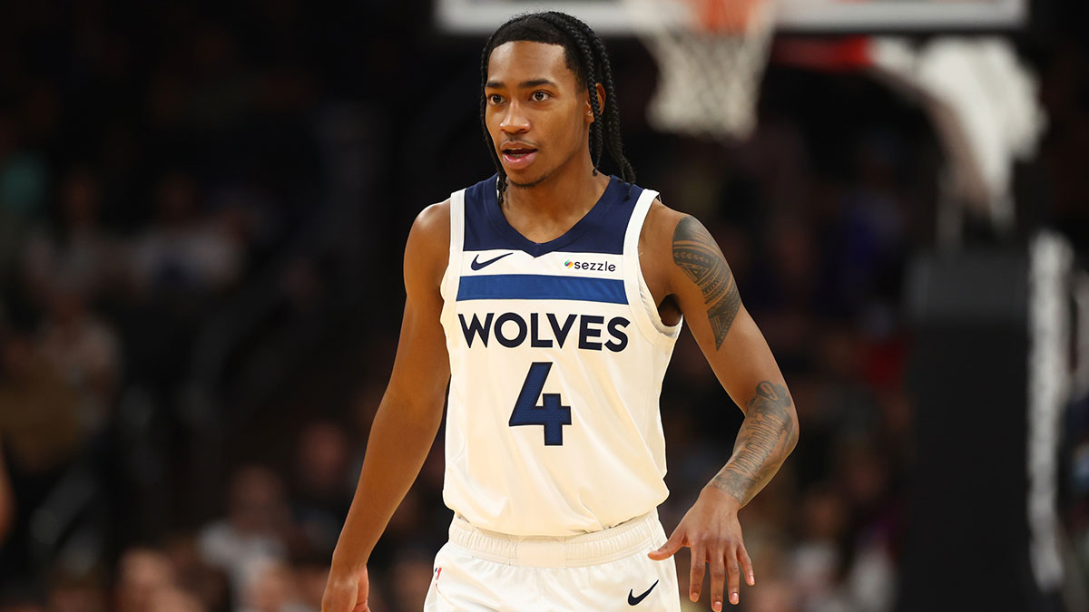 Minnesota Timberwolves guard Rob Dillingham (4) against the Phoenix Suns at Footprint Center.