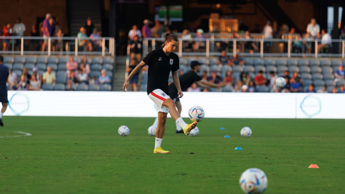 OL Reign forward Tobin Heath (77) warming up before the game against Racing Louisville FC at Lynn Family Stadium.