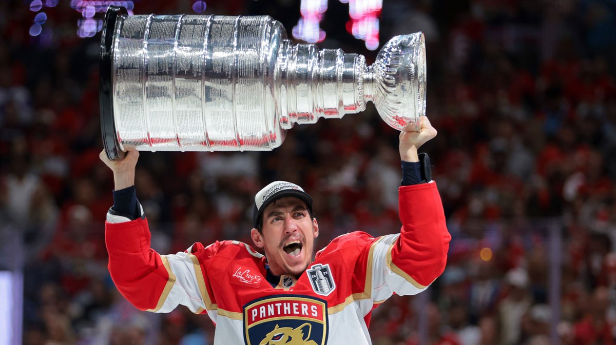 Florida Panthers left wing Tomas Nosek (92) hoists the Stanley Cup after winning game six of the 2025 Stanley Cup Final against the Edmonton Oilers at Amerant Bank Arena.