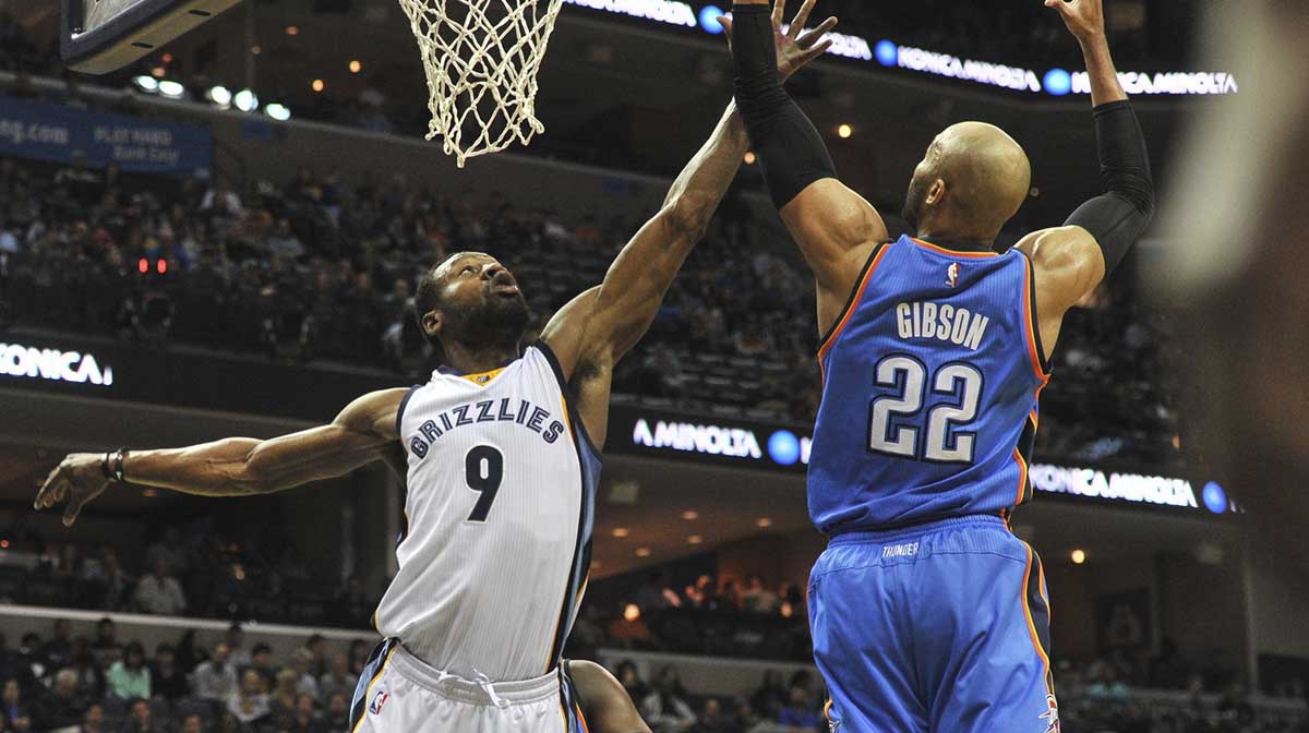Memphis Grizzlies guard Tony Allen (9) and Oklahoma City Thunder forward Taj Gibson (22) fight for the rebound during the first half at FedExForum.