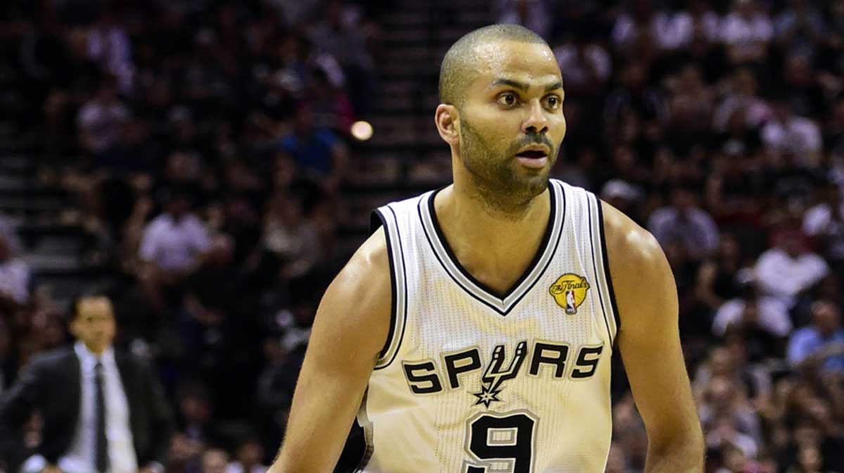 San Antonio Spurs guard Tony Parker (9) drives to the basket against the Miami Heat in game two of the 2014 NBA Finals at AT&T Center.