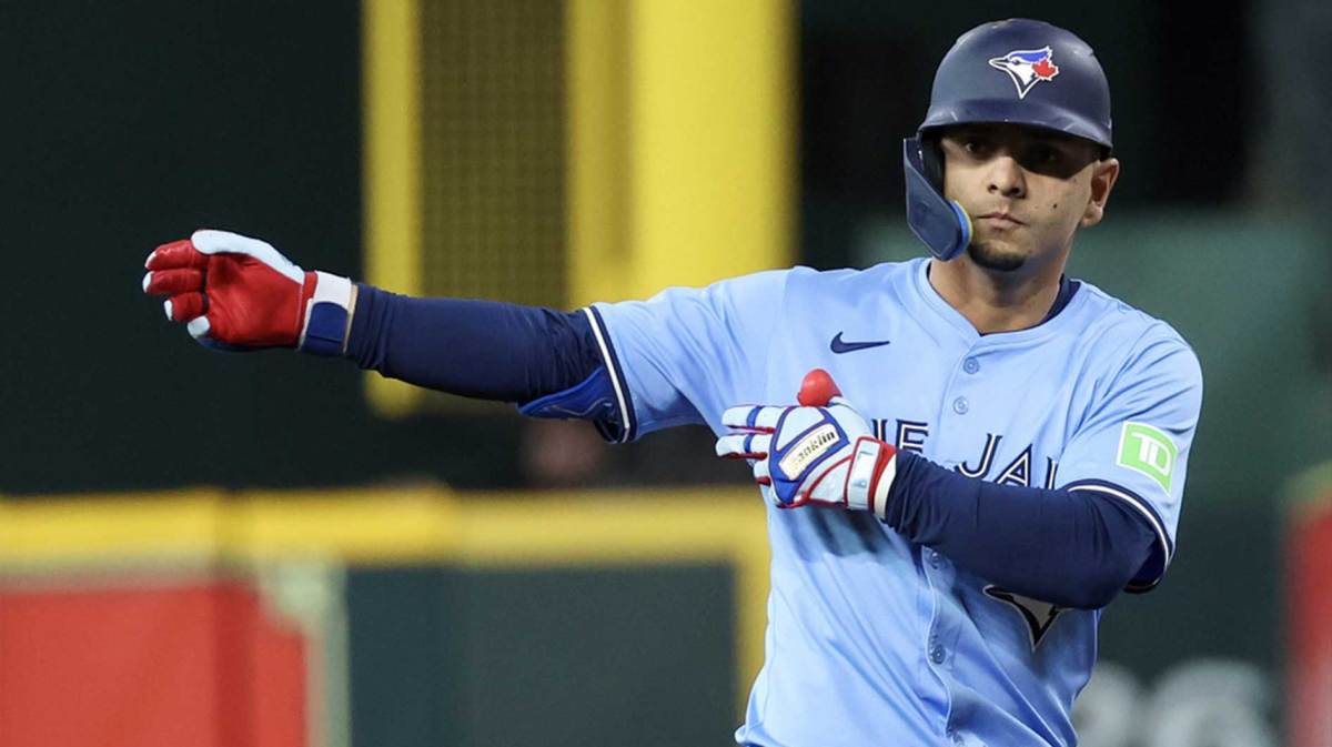 Toronto Blue Jays second baseman Andres Gimenez (0) reacts to his single against the Houston Astros in the second inning at Daikin Park.