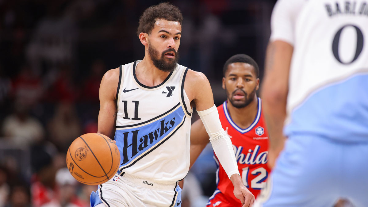 Atlanta Hawks guard Trae Young (11) drives to the basket against the Philadelphia 76ers in the third quarter at State Farm Arena.