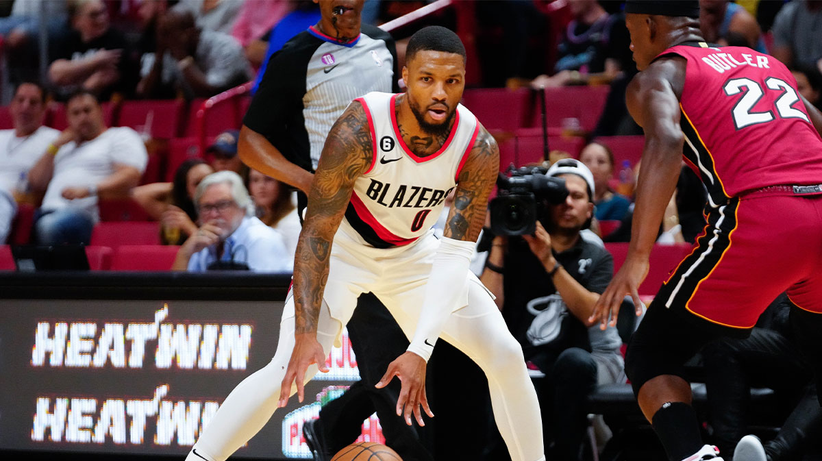 Blazers guard Damian Lillard (0) dribbles the ball
