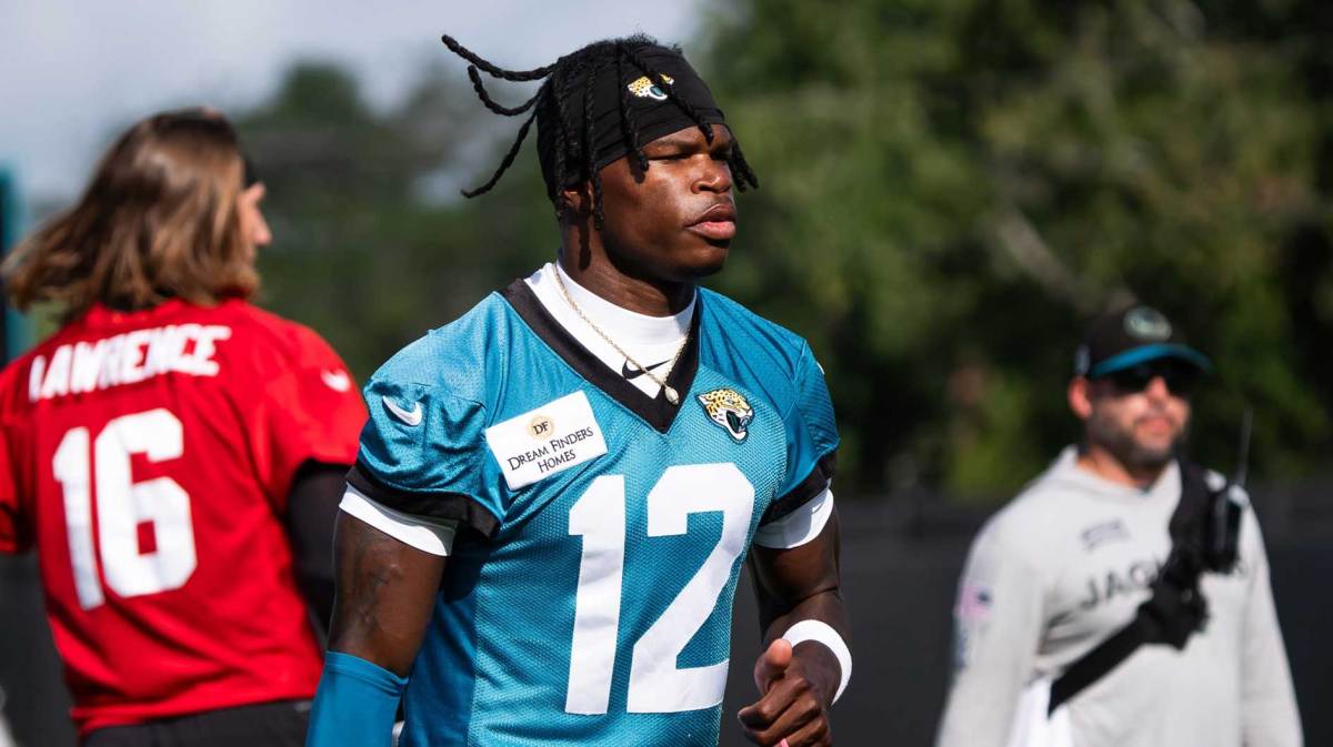 Jacksonville Jaguars wide receiver Travis Hunter (12) jogs to his first drill during the Jacksonville Jaguars’ third mandatory minicamp Thursday June 12, 2025 at the Miller Electric Center in Jacksonville.