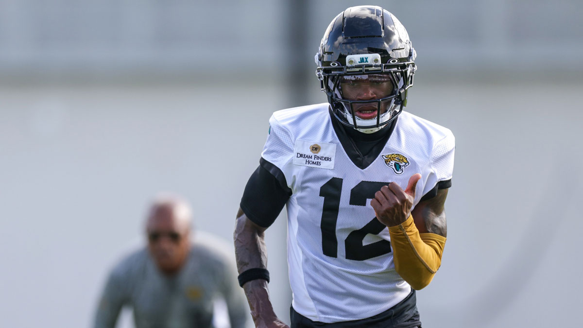 Jacksonville Jaguars wide receiver Travis Hunter (12) participates in training camp at Miller Electric Center