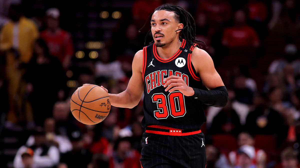 Chicago Bulls guard Tre Jones (30) handles the ball against the Houston Rockets during the first quarter at Toyota Center.