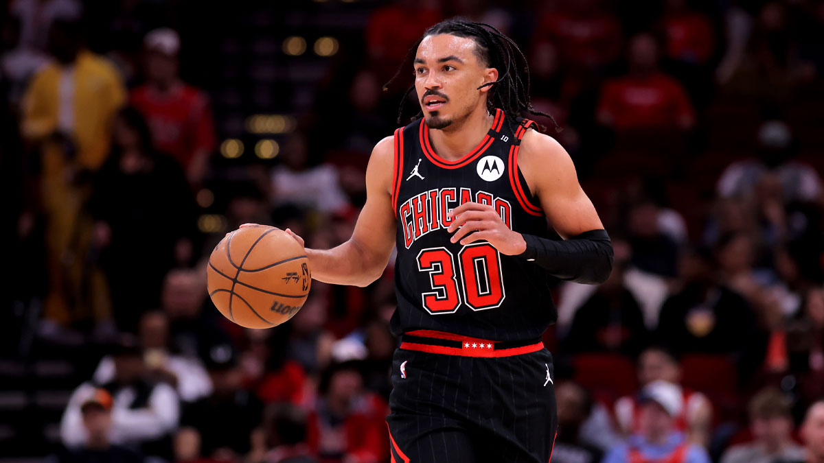 Chicago Bulls guard Tre Jones (30) handles the ball against the Houston Rockets during the first quarter at Toyota Center.