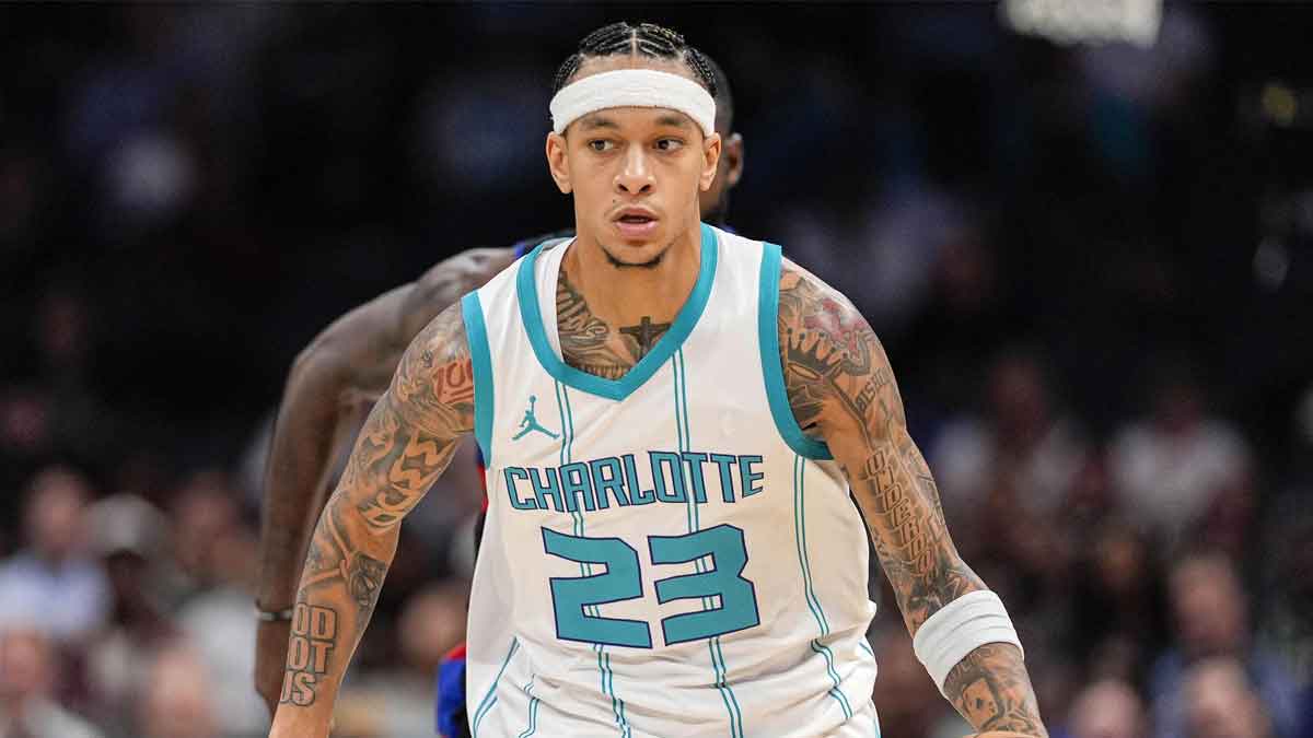 Charlotte Hornets guard Tre Mann (23) handles the ball against the Detroit Pistons during the second half at Spectrum Center.