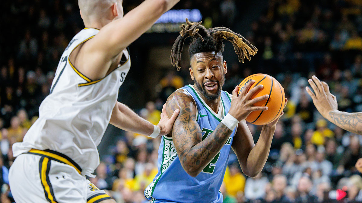 Tulane Green Wave forward Gregg Glenn III (2) drives to the basket during the first half against the Wichita State Shockers at Charles Koch Arena.