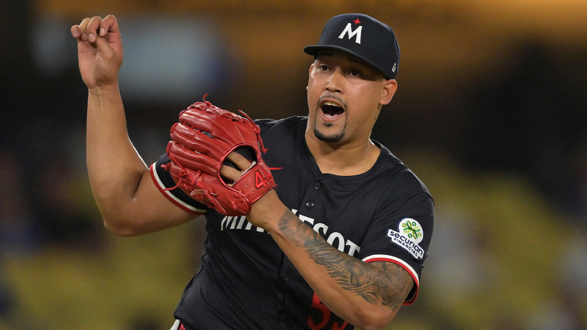 Minnesota Twins relief pitcher Jhoan Duran (59) reacts after the final out of the ninth inning against the Los Angeles Dodgers at Dodger Stadium.