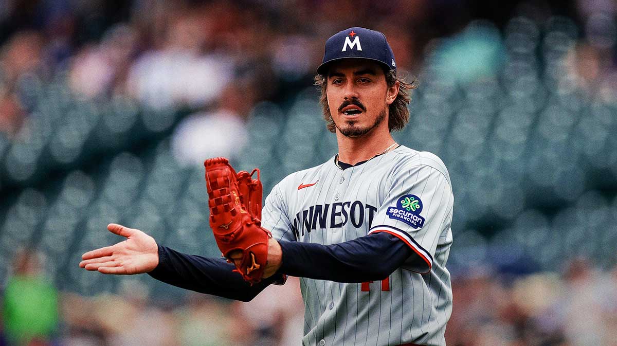Minnesota Twins starting pitcher Joe Ryan (41) reacts after a play in the first inning against the Colorado Rockies at Coors Field.