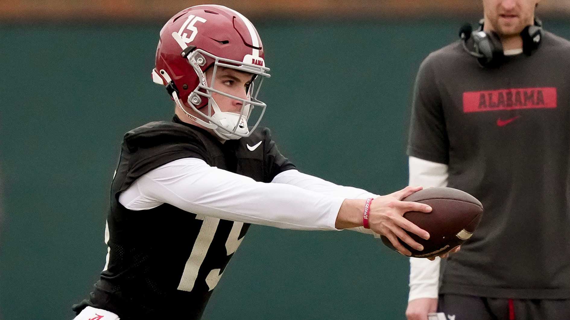 Quarterback Ty Simpson works a drill during Spring Practice for the Crimson Tide.
