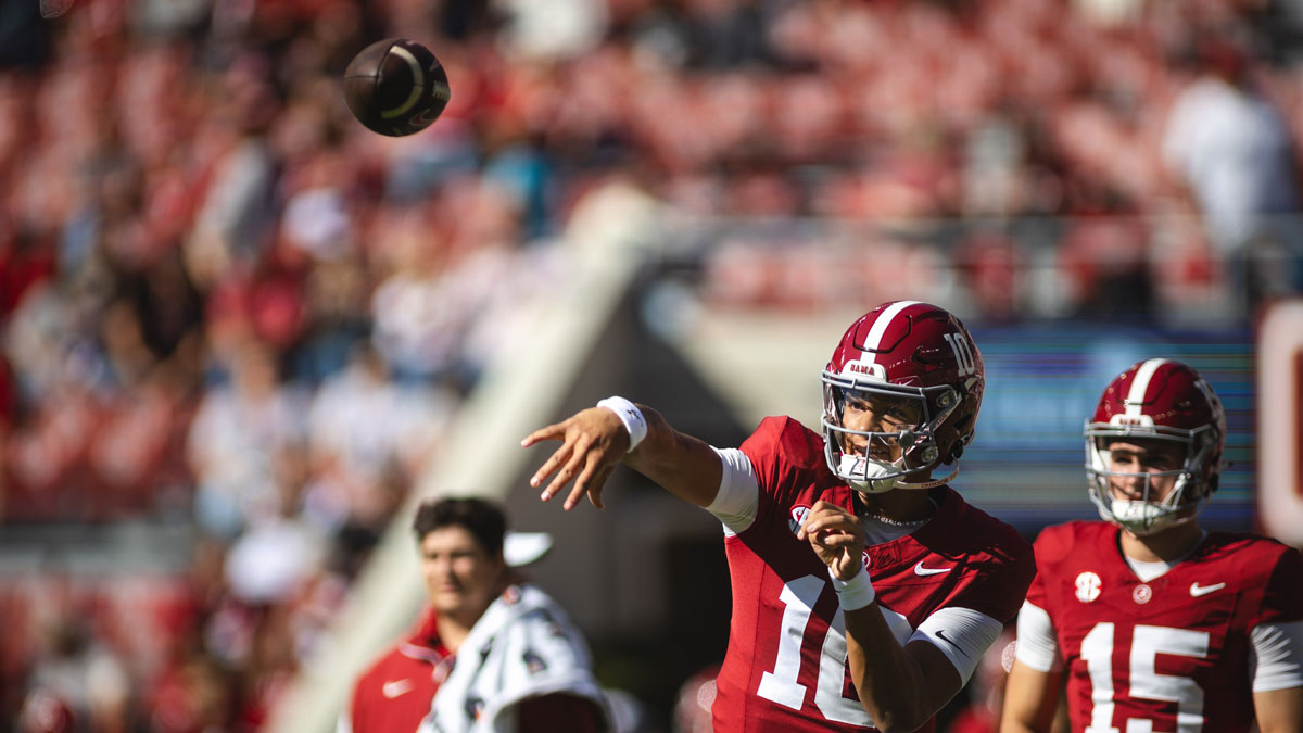 Alabama Crimson Tide quarterback Ty Simpson (15) throws during warmups at Bryant-Denny Stadium.