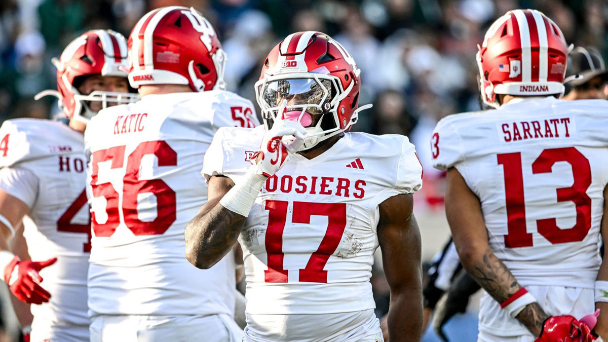Indiana's Ty Son Lawton silences the crowd after a touchdown run against Michigan State during the second quarter on Saturday, Nov. 2, 2024, at Spartan Stadium in East Lansing
