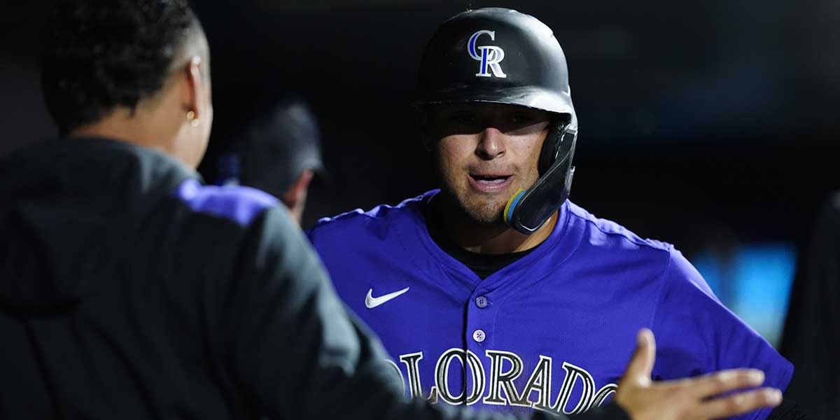 Colorado Rockies right fielder Tyler Freeman (2) celebrates scoring at run eighth inning against the Los Angeles Dodgers