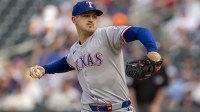 Texas Rangers starting pitcher Tyler Mahle (51) delivers a pitch against the Minnesota Twins in the first inning at Target Field.