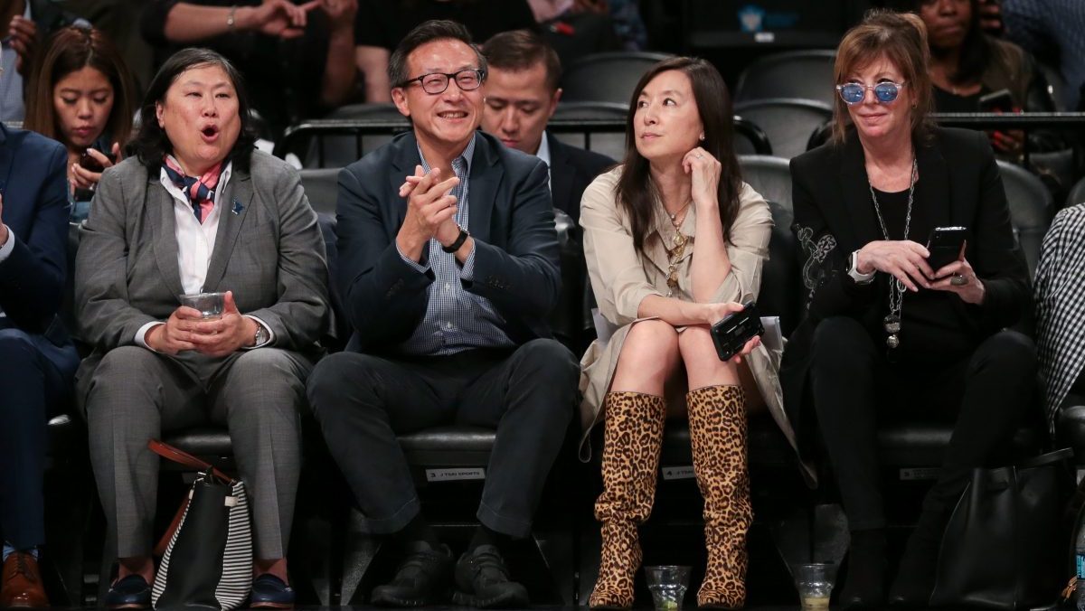 Taiwanese businessman Joe Tsai cheers during the second half of the preseason WNBA game between the New York Liberty and the China National Team at Barclays Center. 