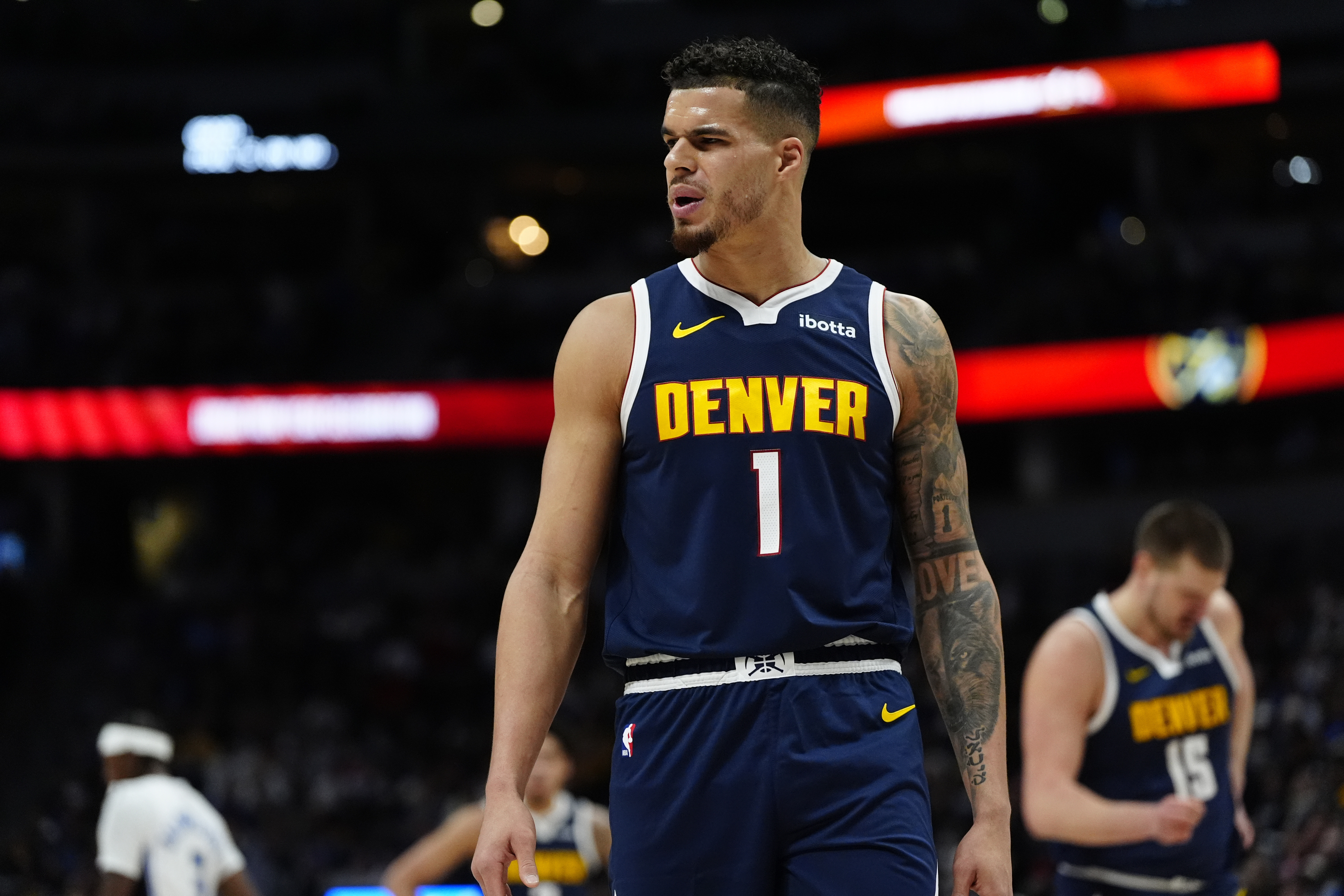 Denver Nuggets forward Michael Porter Jr. (1) reacts in the first quarter against the Orlando Magic at Ball Arena.
