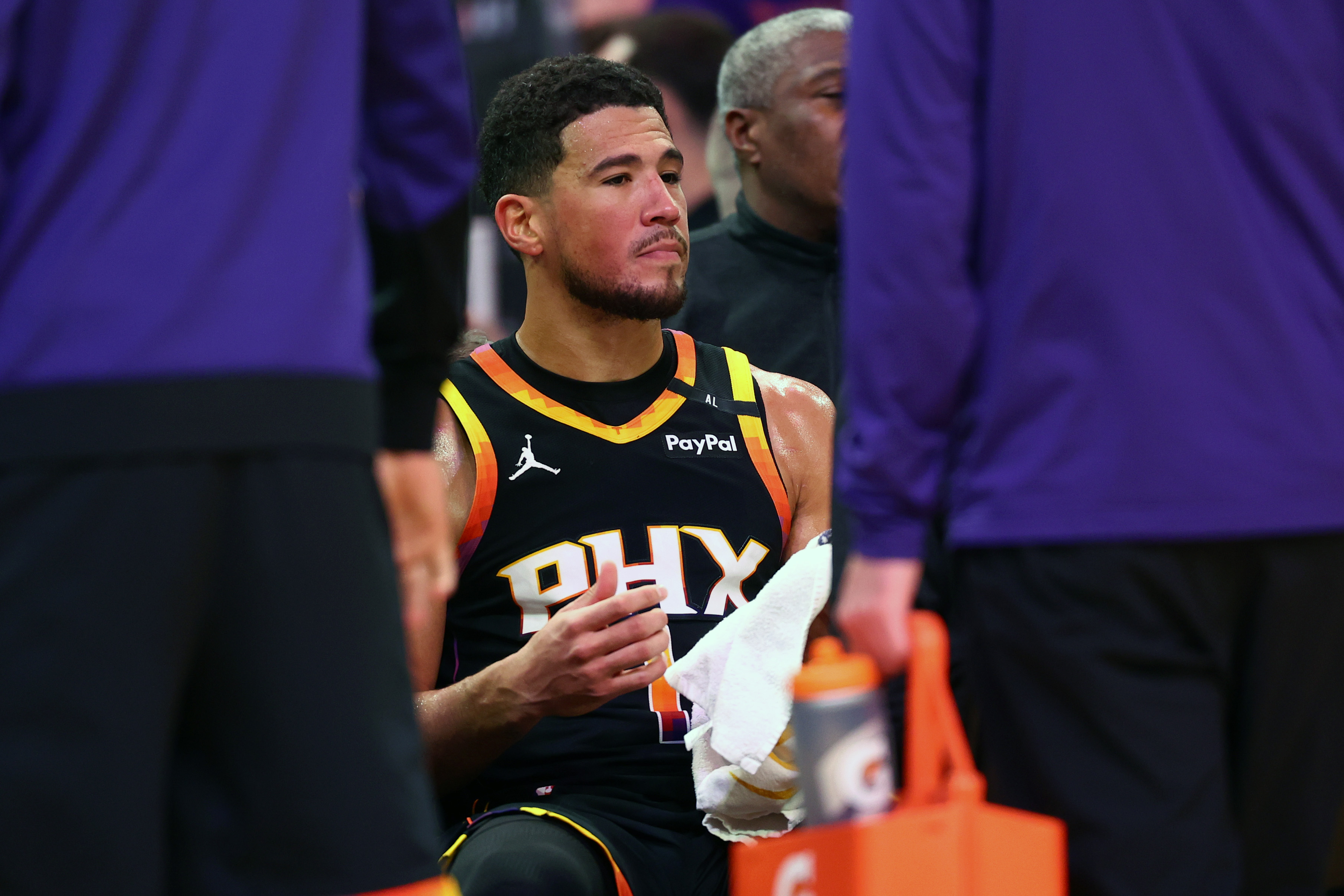Suns guard Devin Booker (1) reacts on the bench against the Oklahoma City Thunder during the second half at Footprint Center.