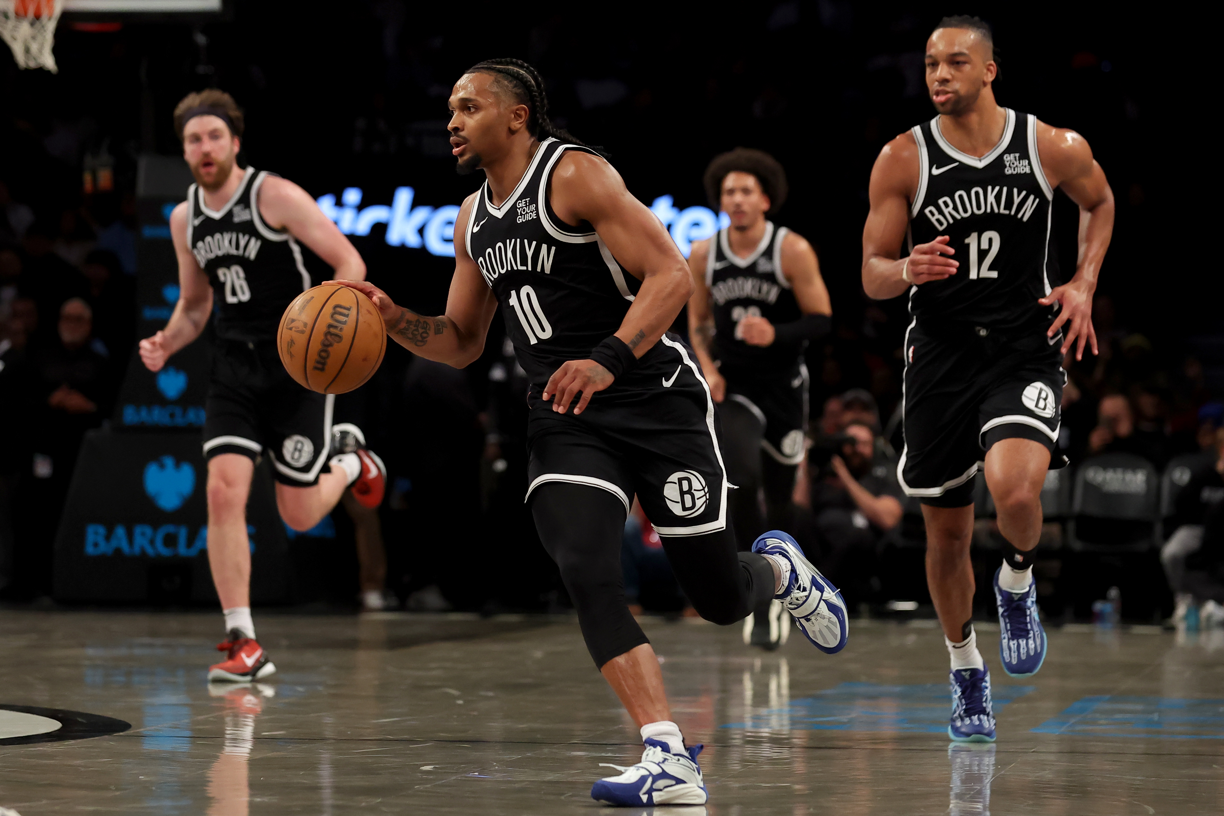 Brooklyn Nets guard Tyson Etienne (10) brings the ball up court against the Atlanta Hawks during the second quarter at Barclays Center.