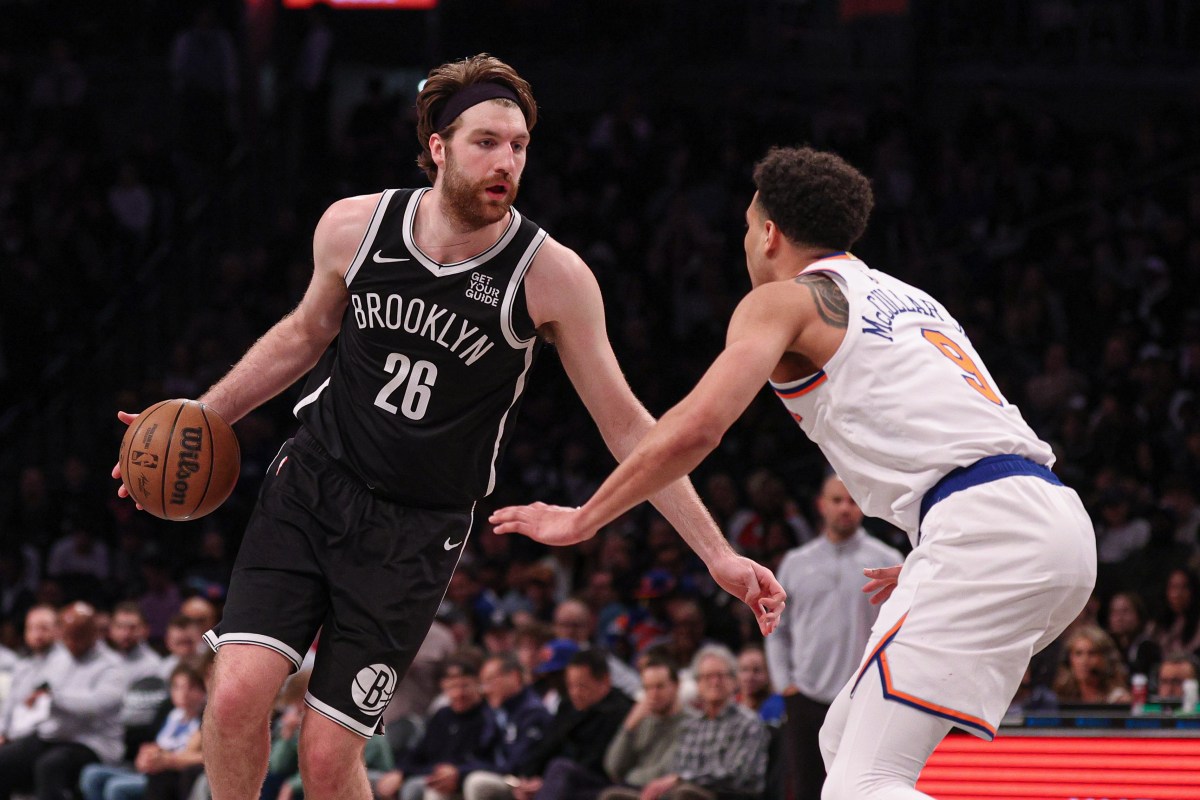 Brooklyn Nets forward Drew Timme (26) is guarded by New York Knicks forward Kevin McCullar Jr. (9) during the second half at Barclays Center.
