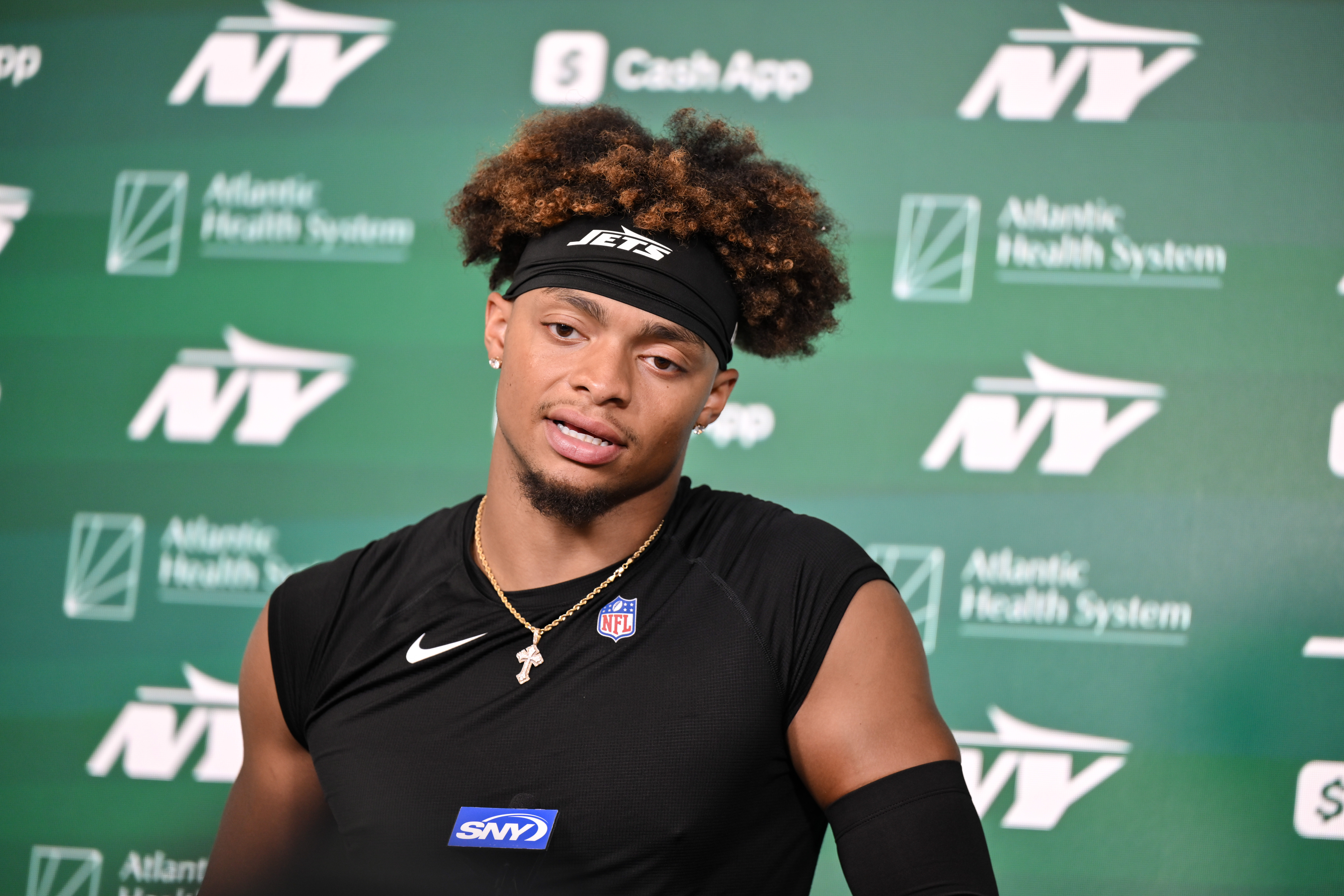 New York Jets quarterback Justin Fields (7) speaks at a press conference during minicamp at Atlantic Health Jets Training Center.