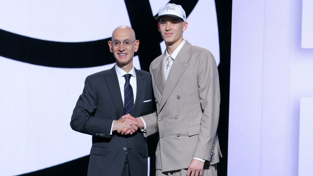 Egor Demin stands with NBA commissioner Adam Silver after being selected as the eighth pick by the Brooklyn Nets in the first round of the 2025 NBA Draft at Barclays Center.