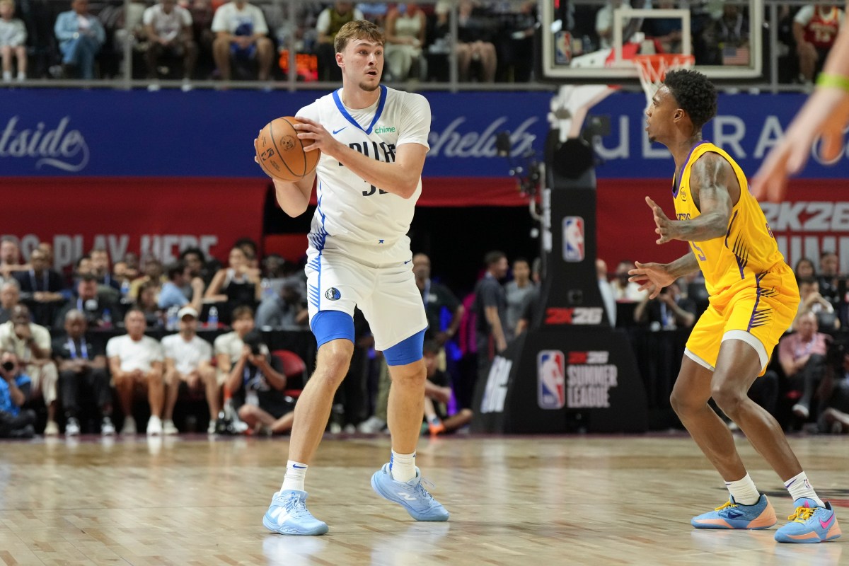 Dallas Mavericks forward Cooper Flagg (32) looks to pass the ball against the Los Angeles Lakers in the first quarter of their game at Thomas & Mack Center.