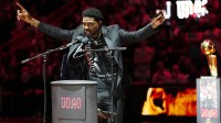 Udonis Haslem speaks after his jersey was lifted to the rafters during the retirement ceremony during halftime of the game between the Miami Heat and the Atlanta Hawks Kaseya Center.