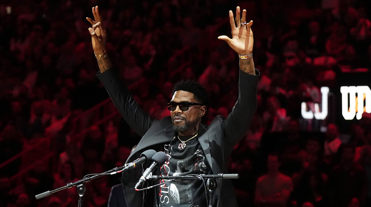 Udonis Haslem speaks after his jersey was lifted to the rafters during the retirement ceremony during halftime of the game between the Miami Heat and the Atlanta Hawks Kaseya Center.