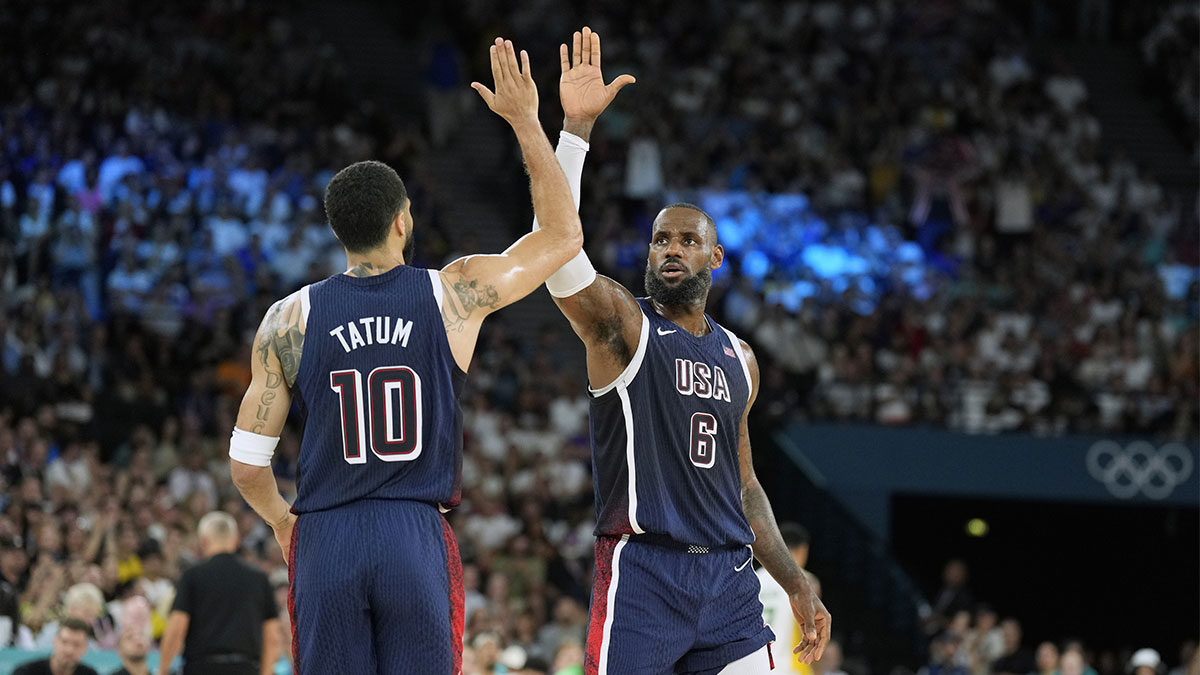 United States guard LeBron James (6) and small forward Jayson Tatum (10) react in the first half against Brazil in a men’s basketball quarterfinal game during the Paris 2024 Olympic Summer Games at Accor Arena.