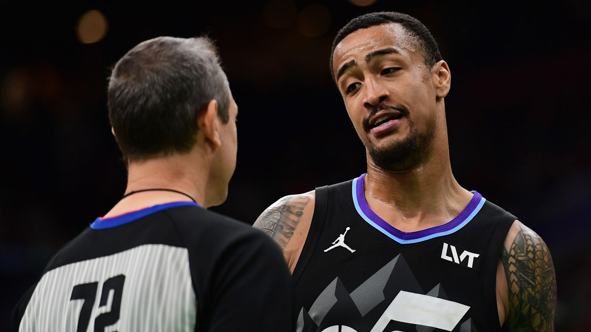 Utah Jazz forward John Collins (20) has words with referee JT Orr during the second half against the Boston Celtics at TD Garden