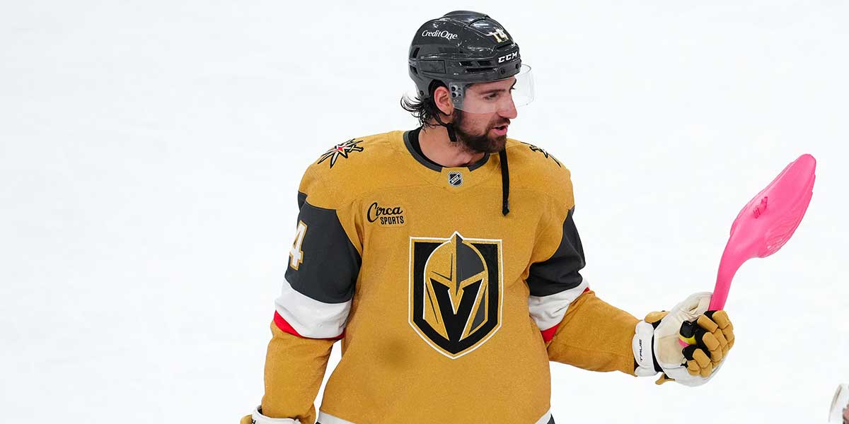 Vegas Golden Knights defenseman Nicolas Hague (14) holds a pink flamingo after the Golden Knights defeated the Chicago Blackhawks 7-5 at T-Mobile Arena.