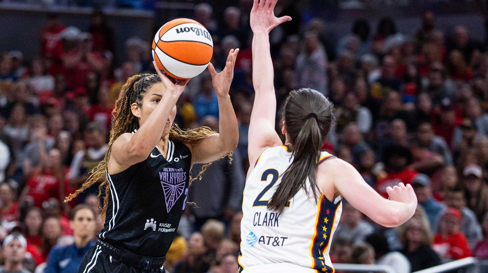Golden State Valkyries guard Veronica Burton (22) shoots the ball while Indiana Fever guard Caitlin Clark (22) defends in the second half at Gainbridge Fieldhouse.