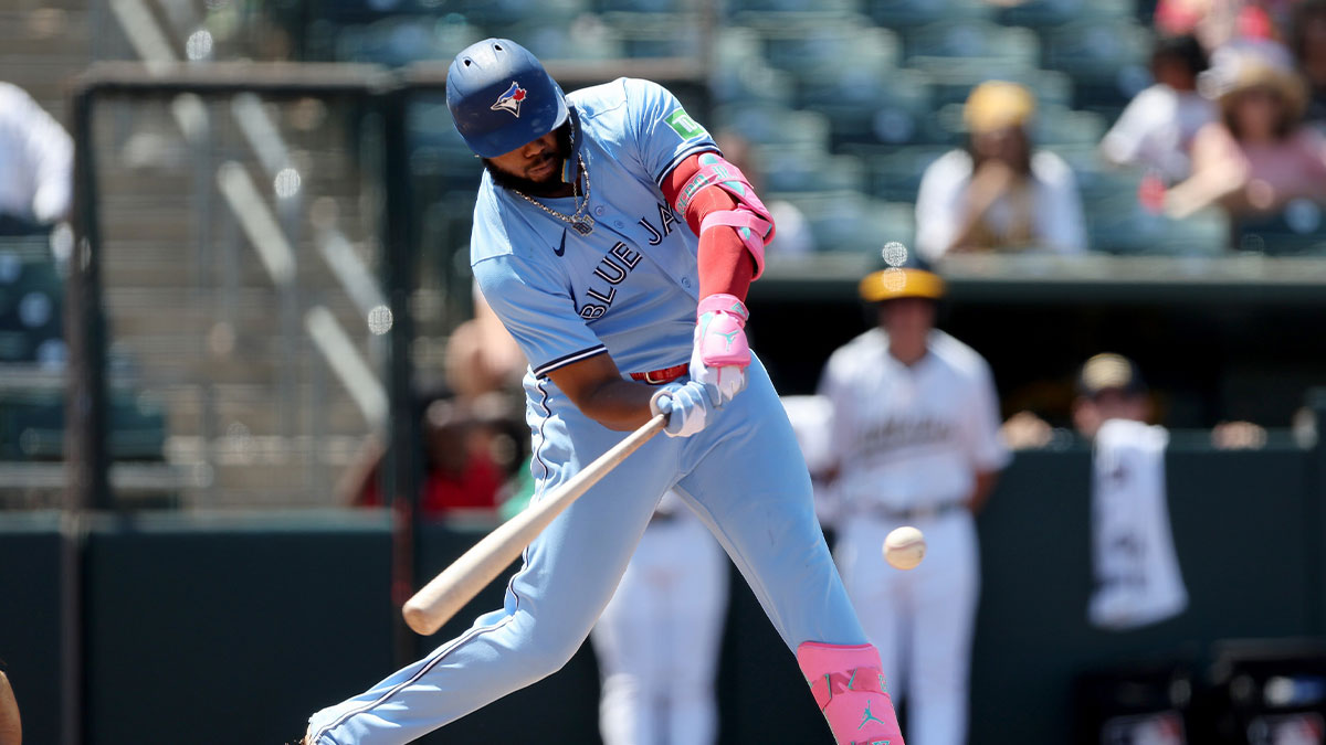 Toronto Blue Jays designated hitter Vladimir Guerrero Jr. (27) hits a single against the Athletics during the seventh inning at Sutter Health Park