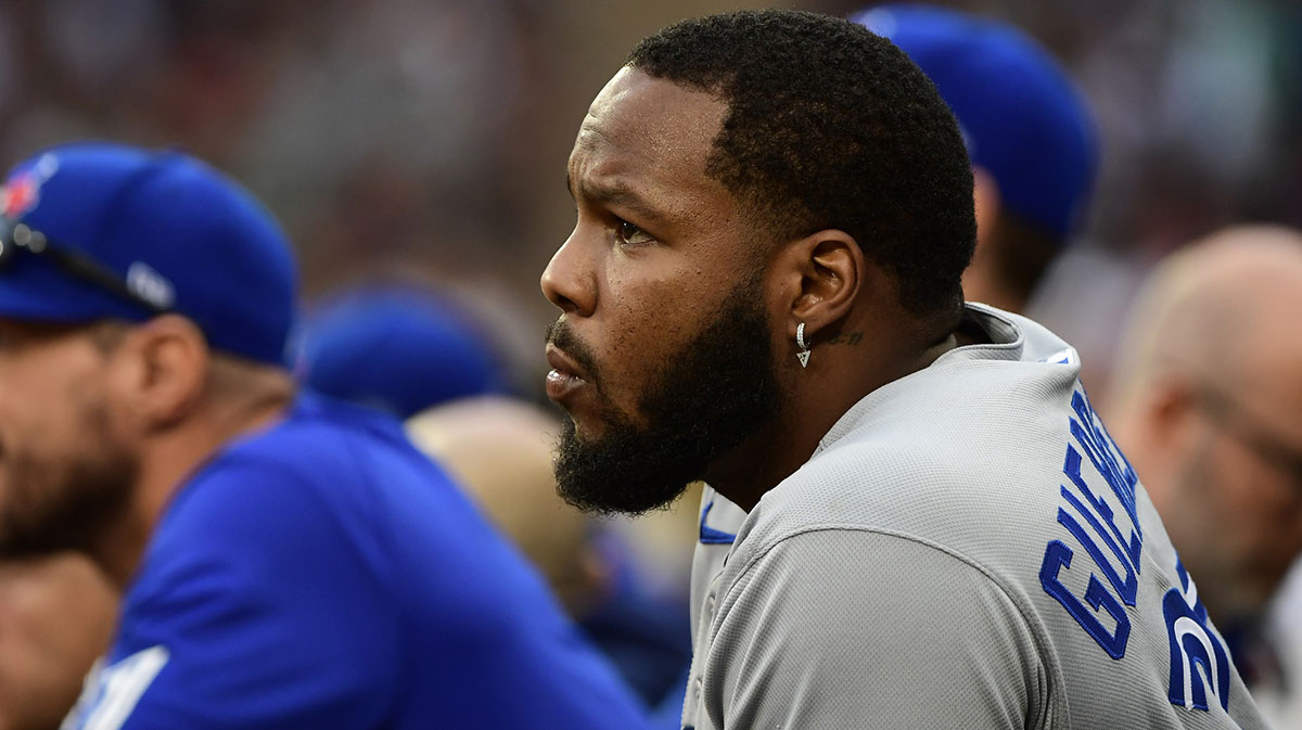 Jun 28, 2025; Boston, Massachusetts, USA; Toronto Blue Jays designated hitter Vladimir Guerrero Jr. (27) watches from the dugout during the ninth inning against the Boston Red Sox at Fenway Park. Mandatory Credit: Bob DeChiara-Imagn Images
